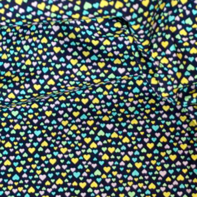 Tecido Tricoline Siena Corações Pequenos Coloridos - Fundo Azul Marinho - 100% Algodão - Largura 1,50m